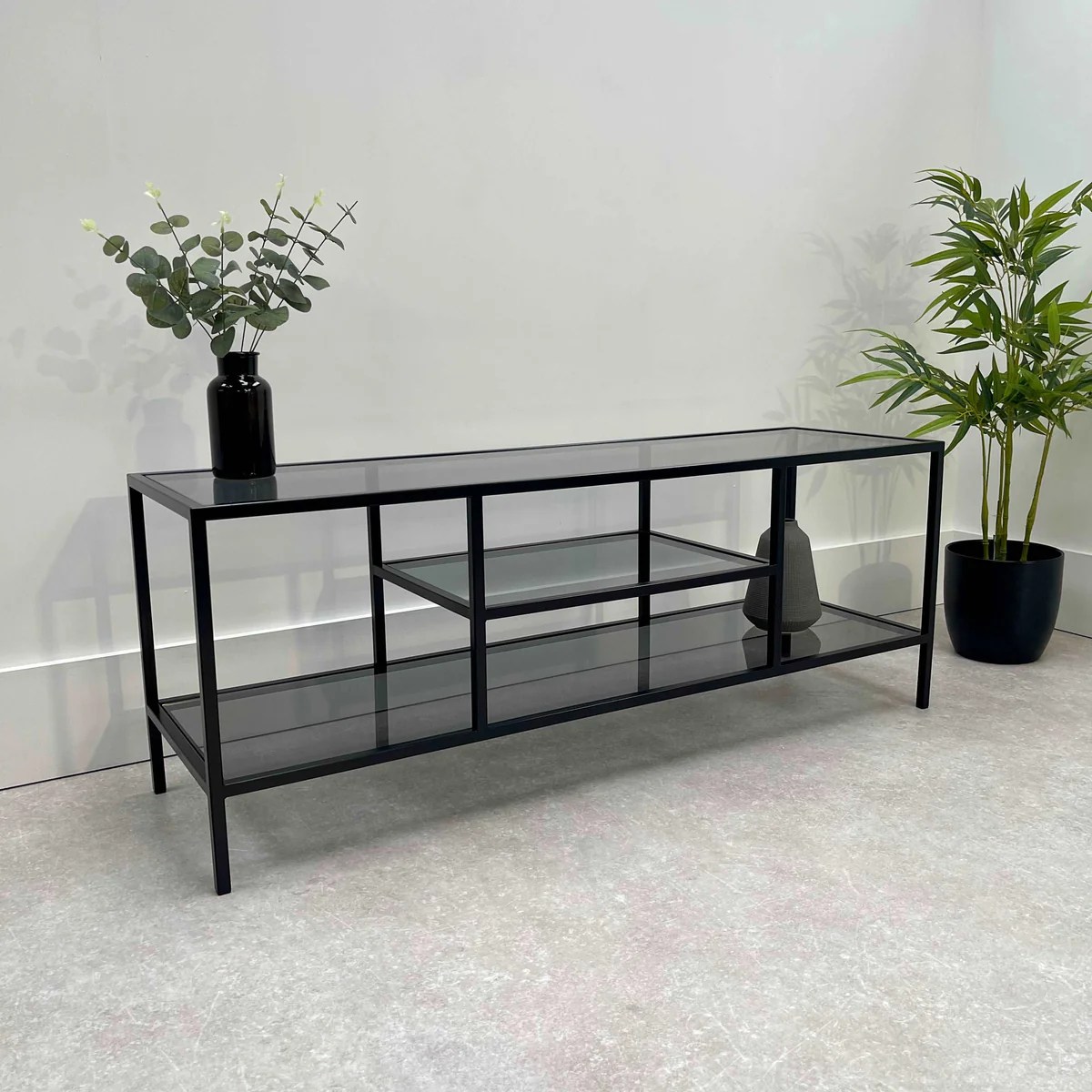 Black glass tv unit with Frame - Homegenies Black glass TV furniture with wire management